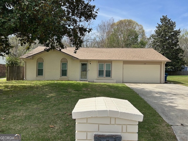 3260 Valley Bend Road South Fulton, GA 30349 - Photo 3 of 23 a front view of a house with a garden