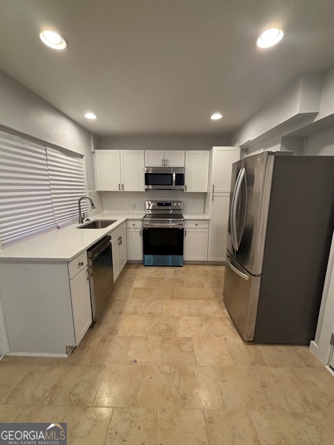 3260 Valley Bend Road South Fulton, GA 30349 - Photo 7 of 23 a kitchen with stainless steel appliances granite countertop a refrigerator sink and stove