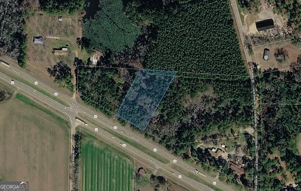 a view of a yard from a balcony