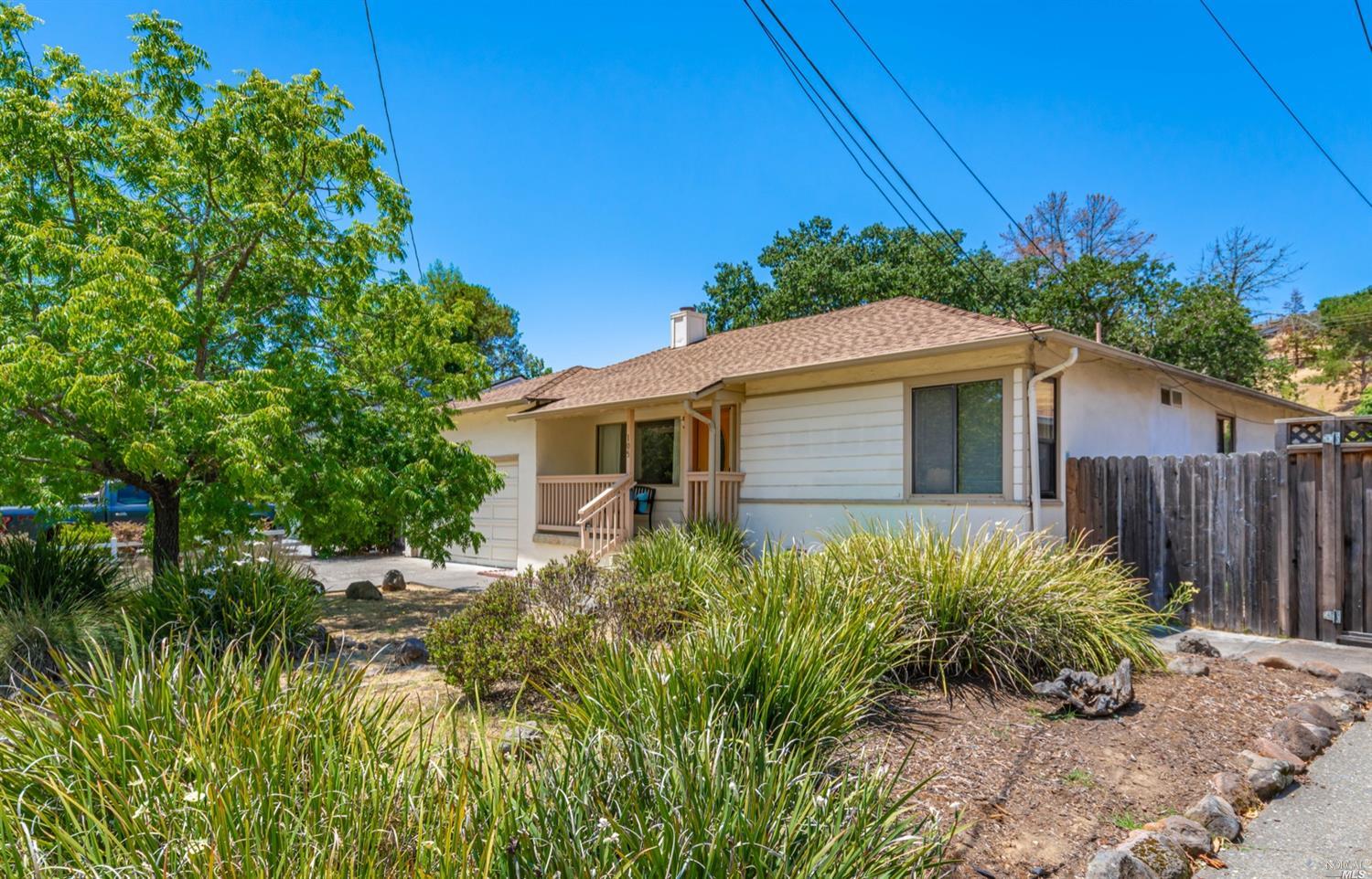 105 Corrillo Drive San Rafael, CA 94903 - Photo 1 of 1 a front view of a house with garden