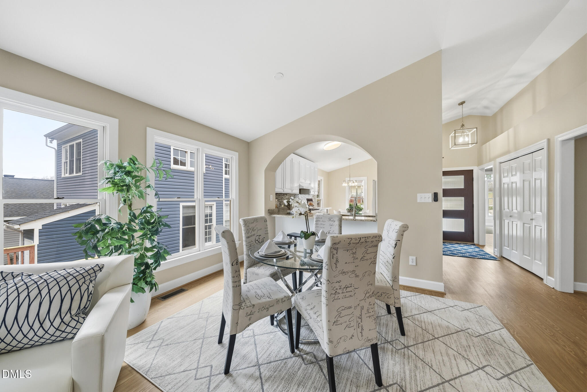 1944 Talamore Court Raleigh, NC 27604 - Photo 11 of 30 a view of a dining room with furniture and wooden floor