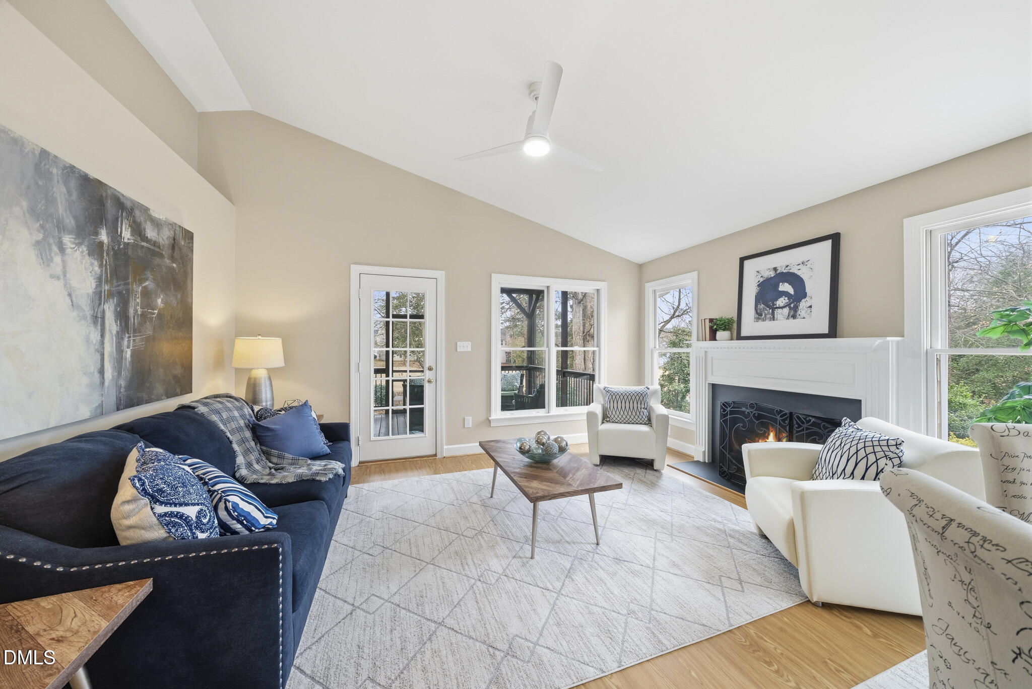 1944 Talamore Court Raleigh, NC 27604 - Photo 13 of 30 a living room with furniture and a fireplace