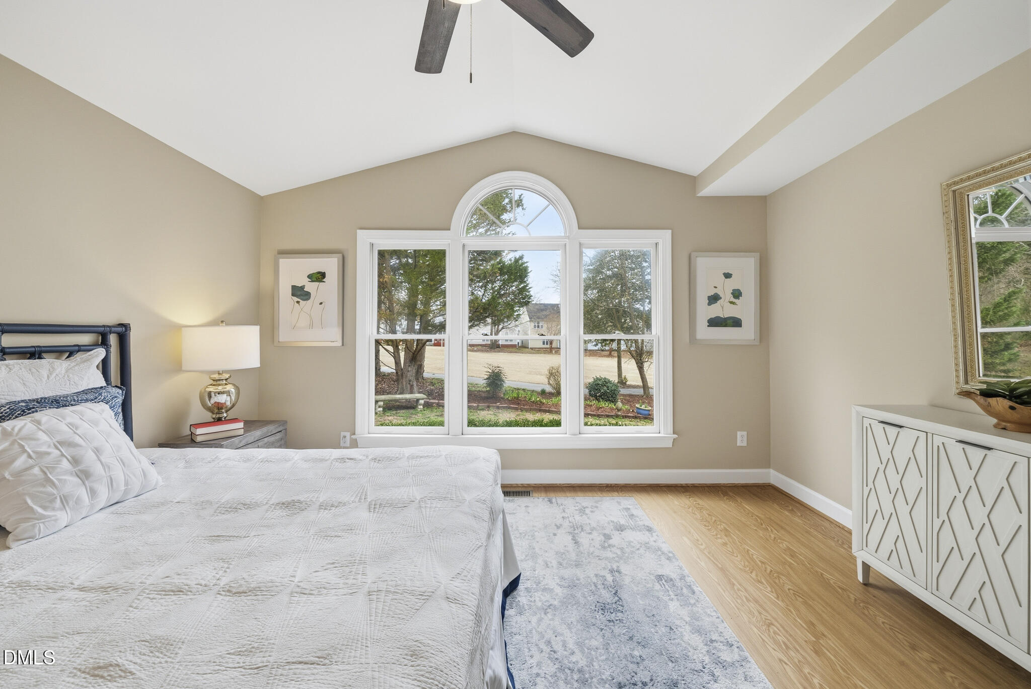 1944 Talamore Court Raleigh, NC 27604 - Photo 16 of 30 a view of a bedroom with wooden floor and window