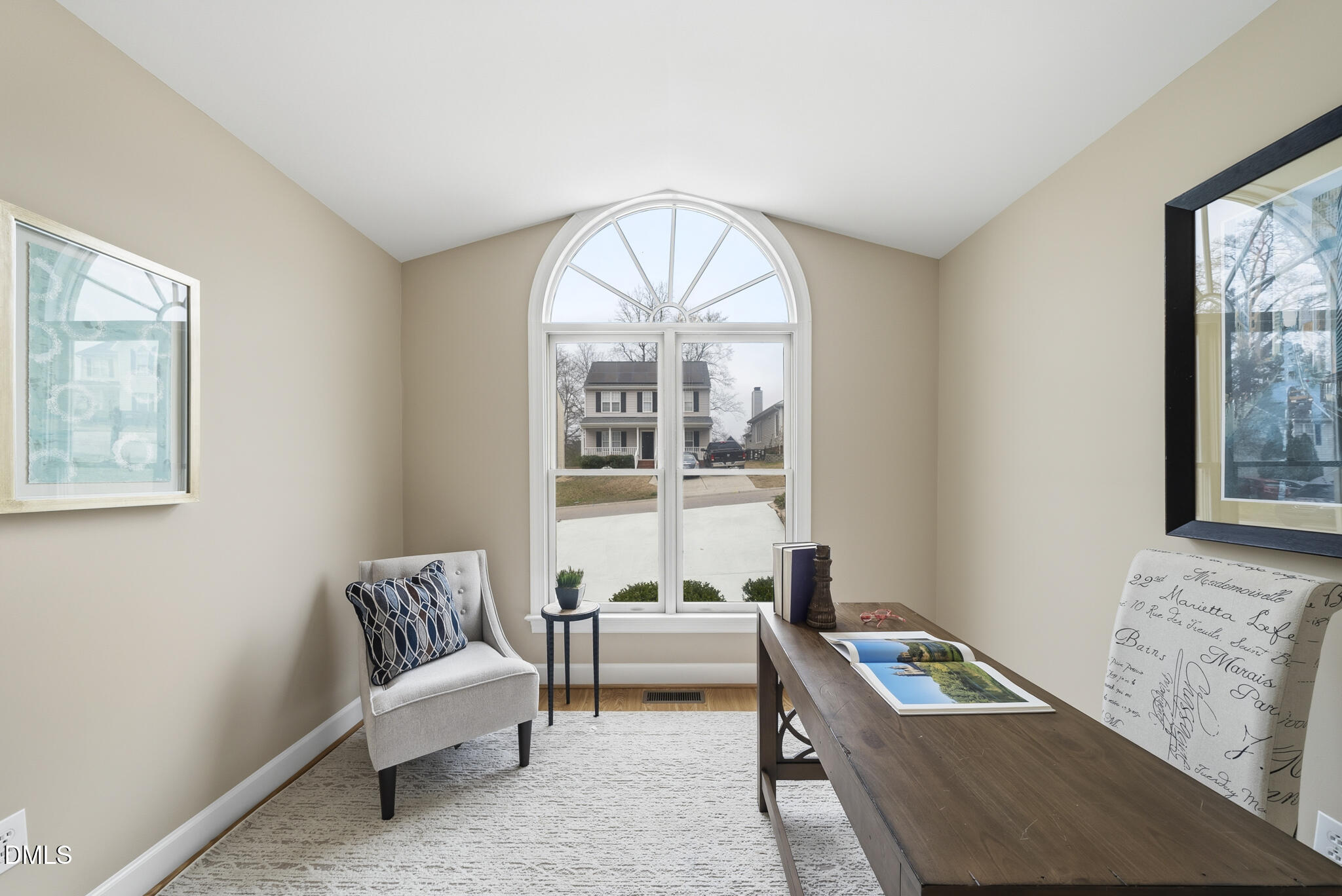 1944 Talamore Court Raleigh, NC 27604 - Photo 20 of 30 a living room with furniture and a large window