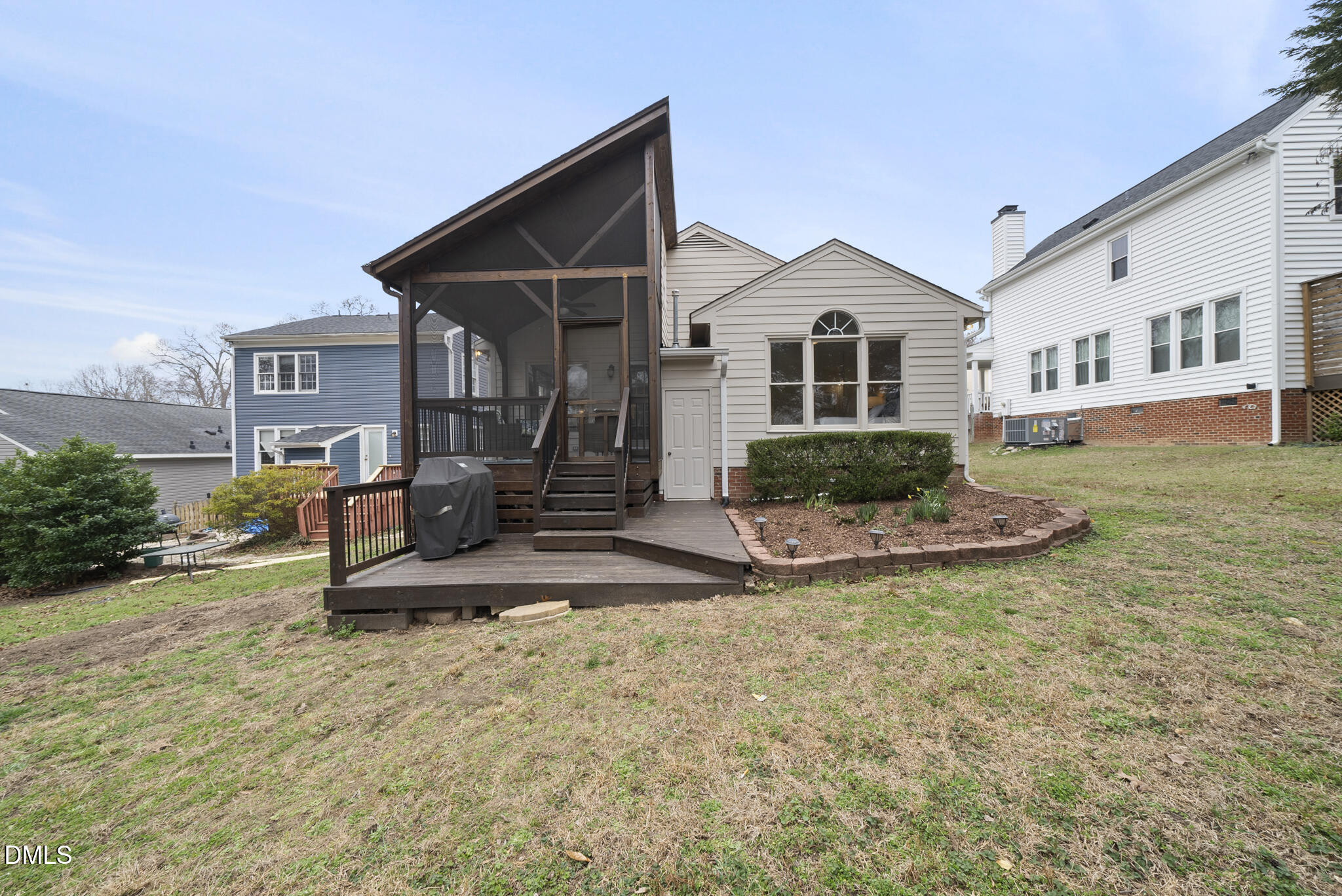 1944 Talamore Court Raleigh, NC 27604 - Photo 26 of 30 a view of a house with backyard and sitting area