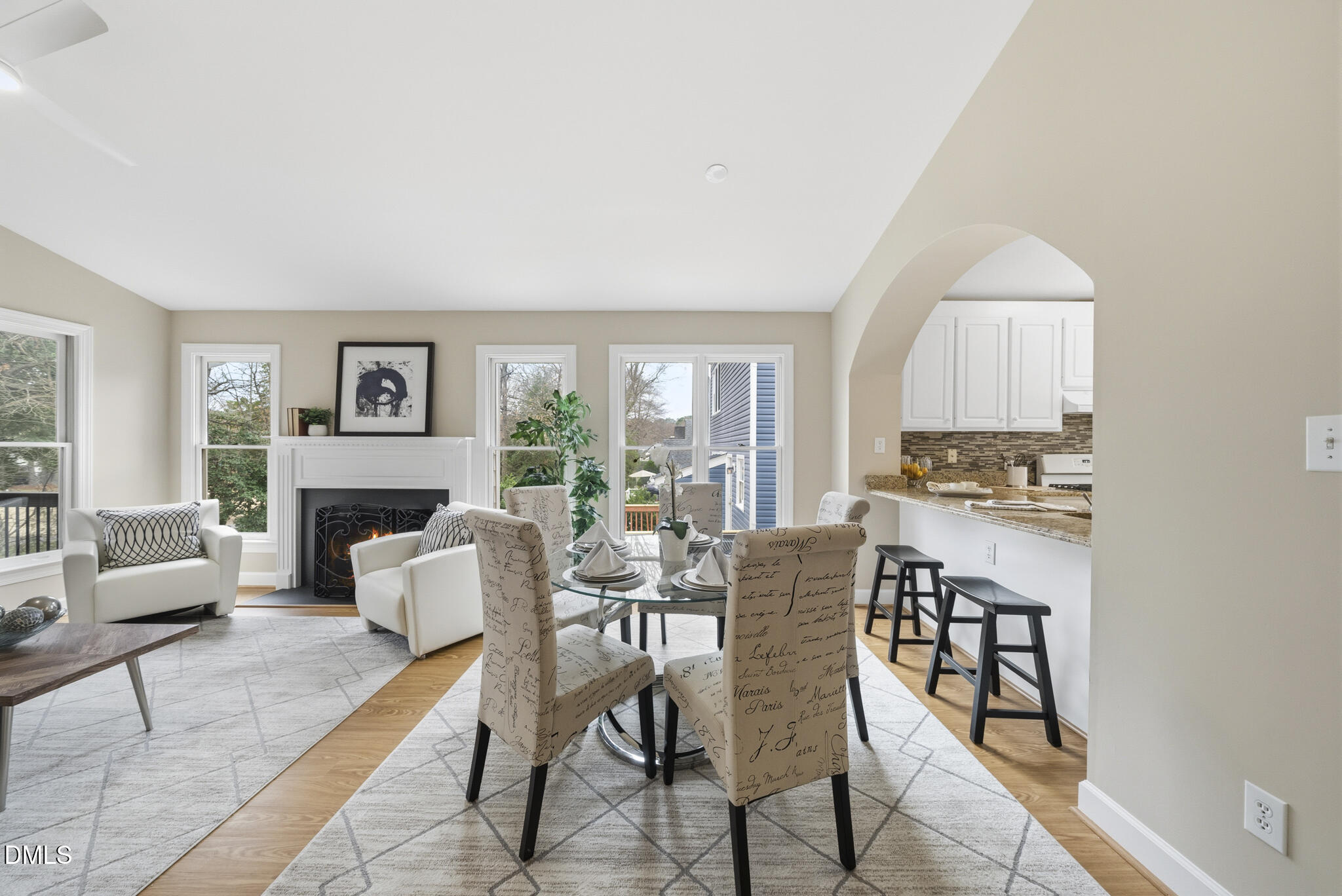 1944 Talamore Court Raleigh, NC 27604 - Photo 10 of 30 a view of a dining room with furniture window and wooden floor