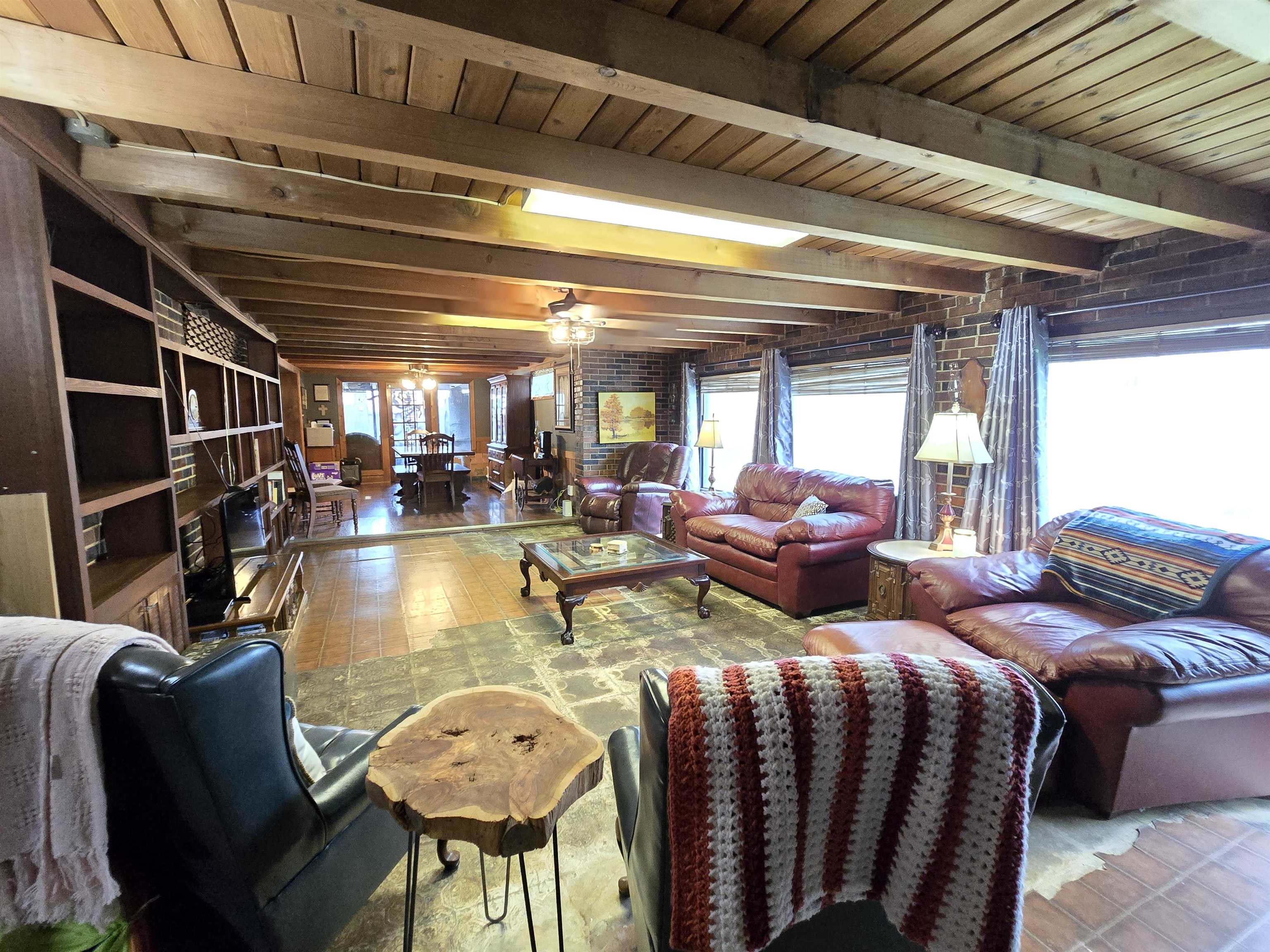 4885 Macon Road Memphis, TN 38122 - Photo 36 of 39 a living room with furniture and a chandelier