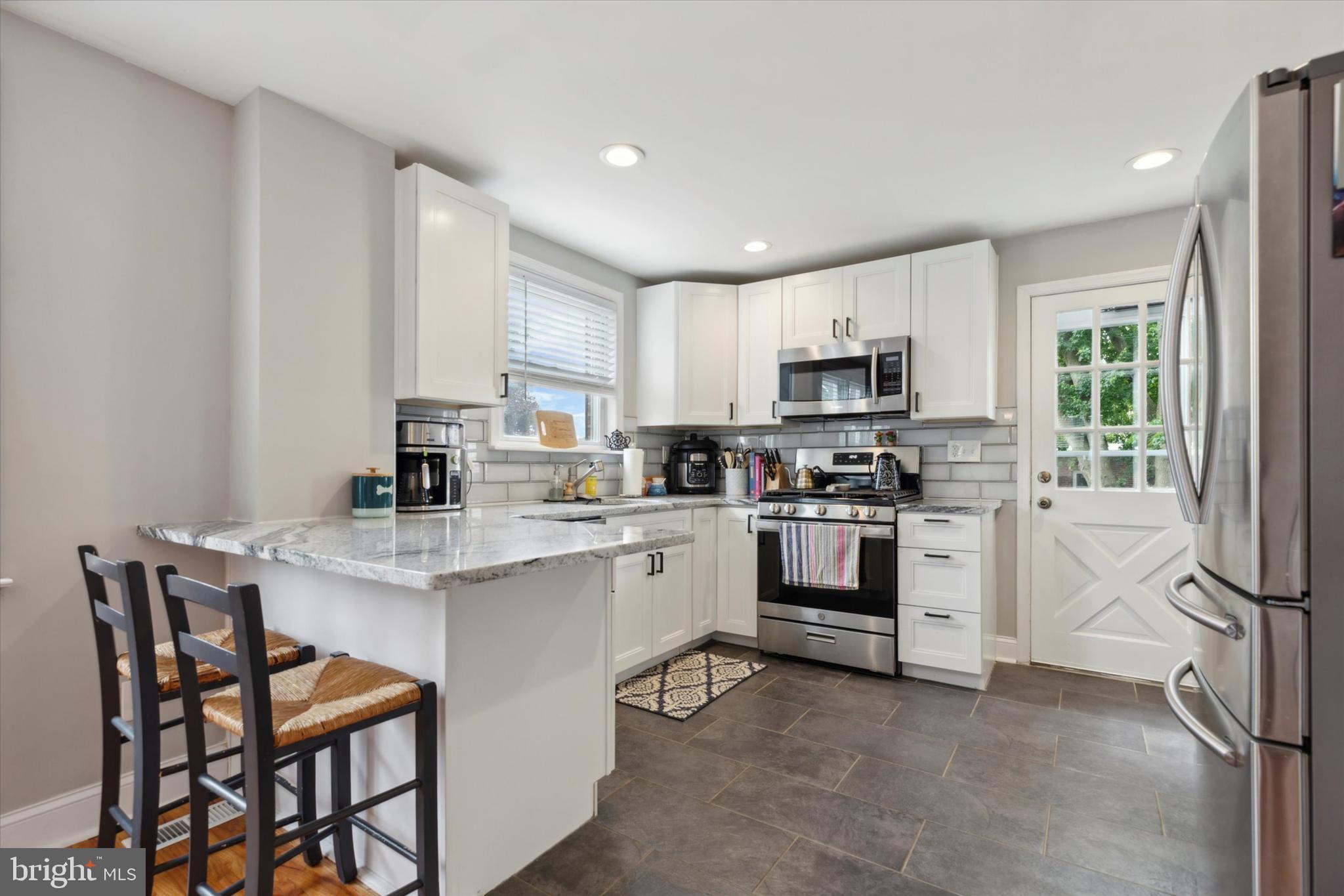 563 Overlook Road Philadelphia, PA 19128 - Photo 8 of 26 Fully Remodeled Kitchen w/Peninsula Seating