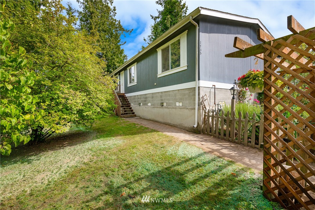1735 Kaas Road Ferndale, WA 98248 - Photo 3 of 37 a view of a back yard of the house