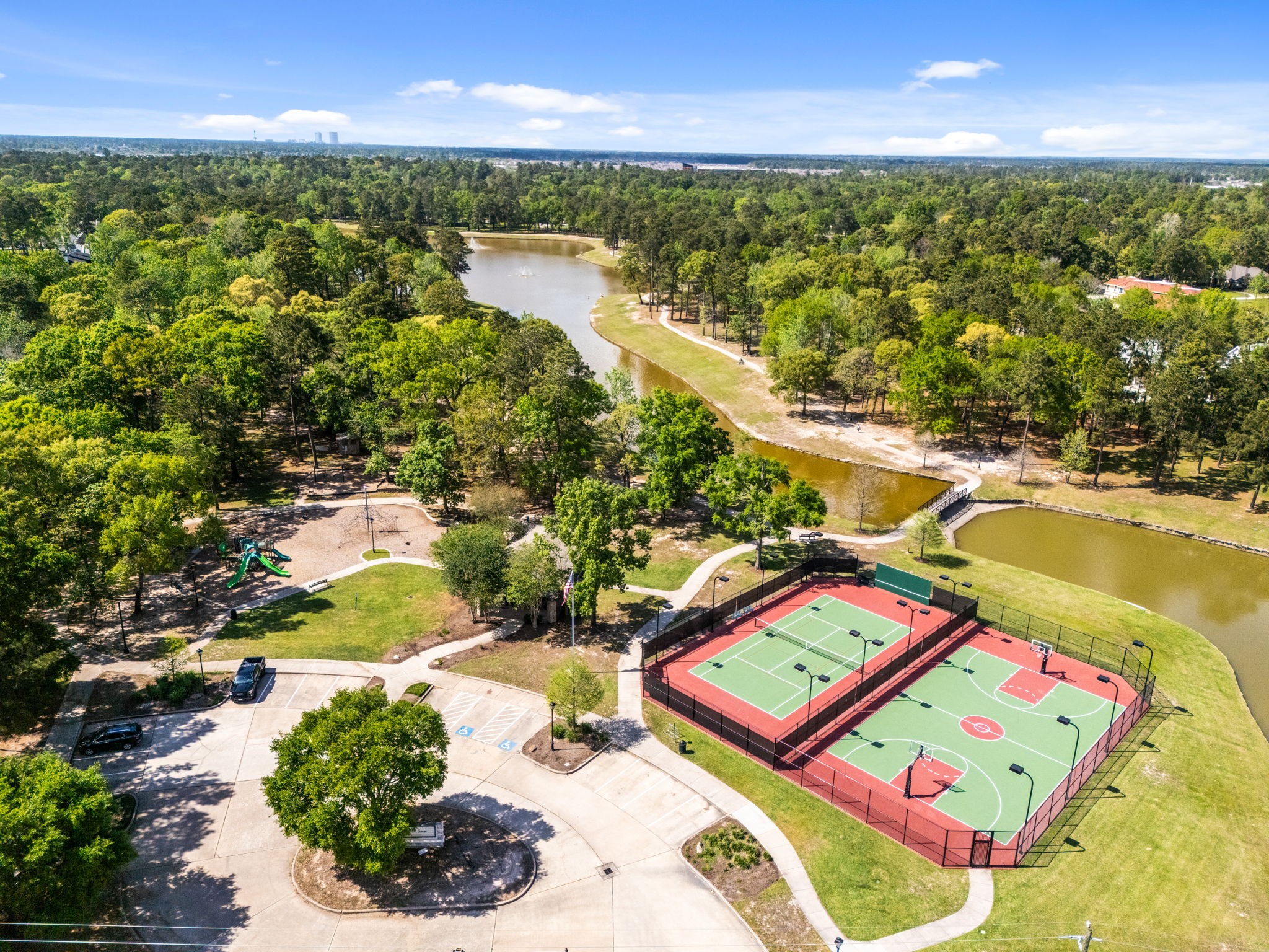 3922 Waterbend Cove Spring, TX 77386 - Photo 38 of 42 Basketball and tennis courts off the water!