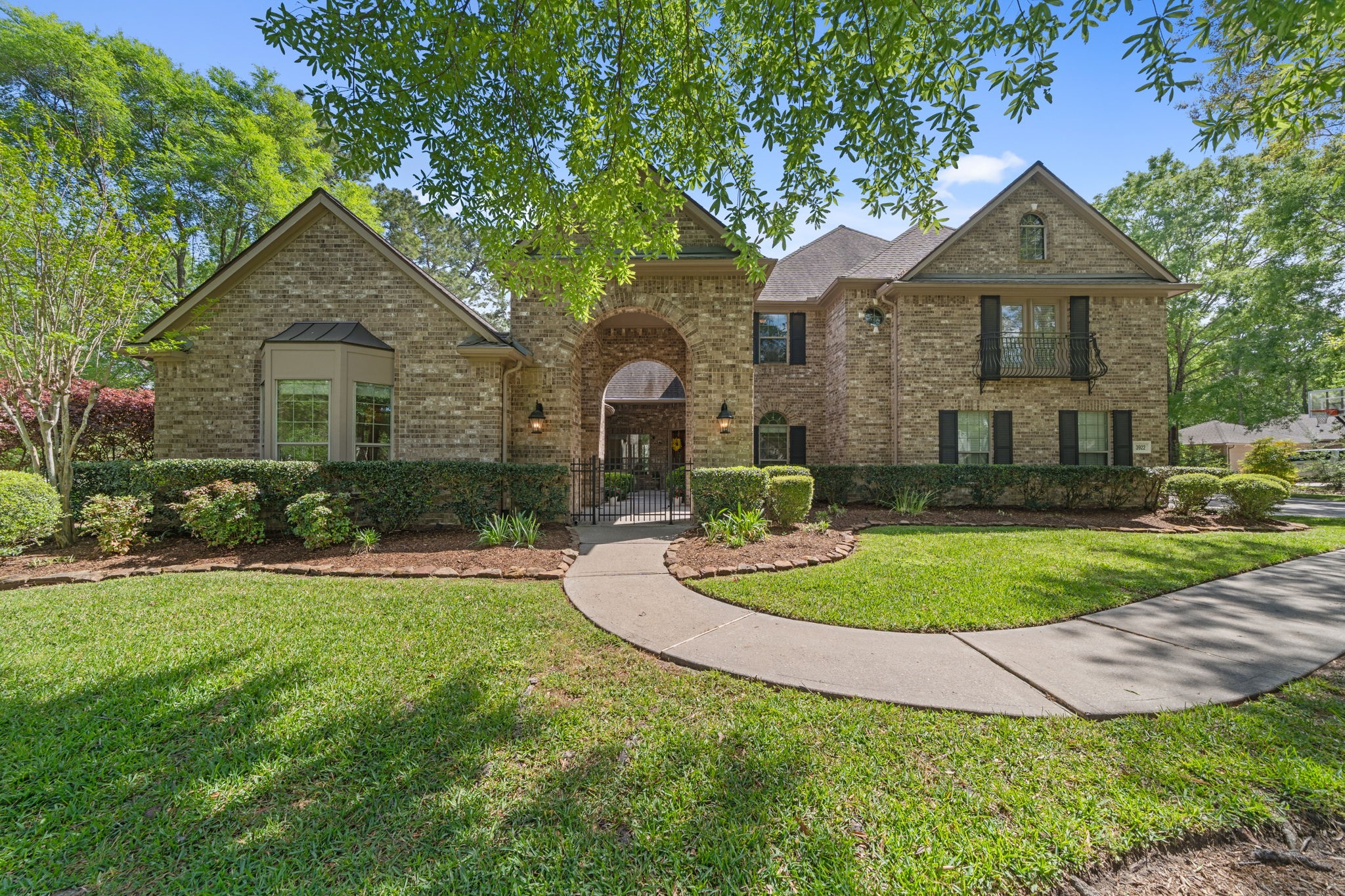3922 Waterbend Cove Spring, TX 77386 - Photo 8 of 42 Stunning home on a 1.1 acre corner lot! You'll step into a gated courtyard as you enter.