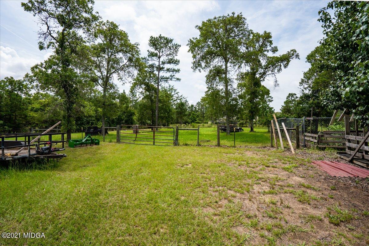 2696 Lower Hartley Bridge Road Byron, GA 31008 - Photo 6 of 24 a view of a field with a tree