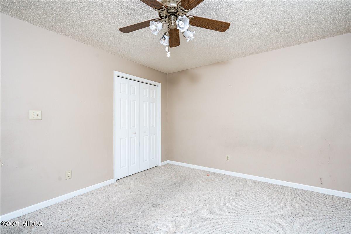 2696 Lower Hartley Bridge Road Byron, GA 31008 - Photo 10 of 24 an empty room