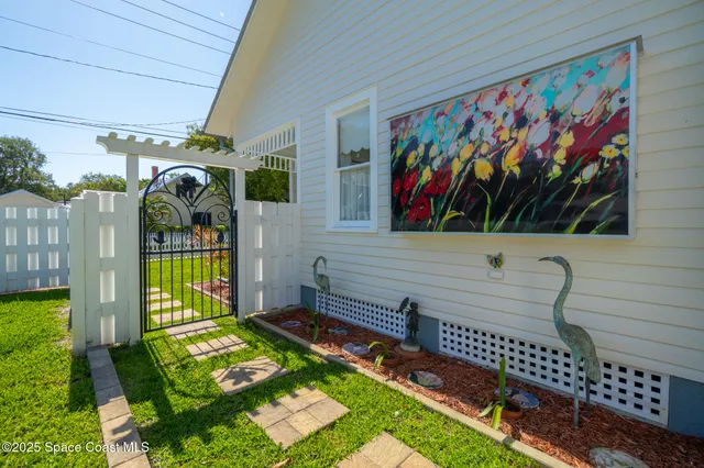 a view of a park with large trees