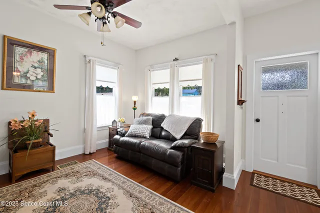 a kitchen with stainless steel appliances granite countertop a refrigerator and a stove