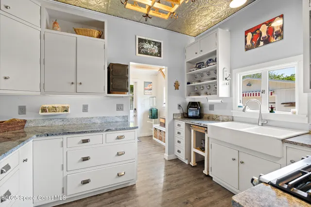 a view of staircase with wooden floor