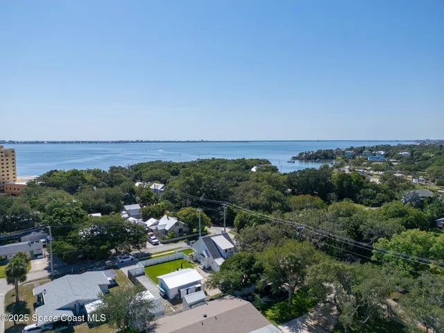 an aerial view of a house with a garden