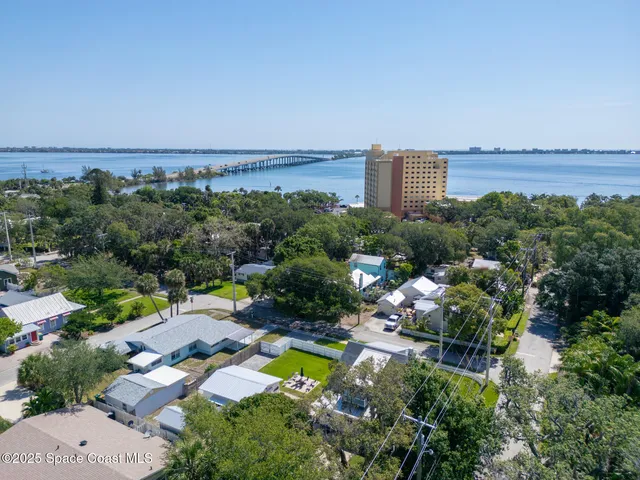 a view of a house with a yard balcony