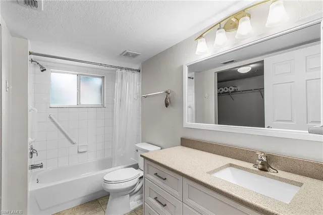 front view of a house with a garden