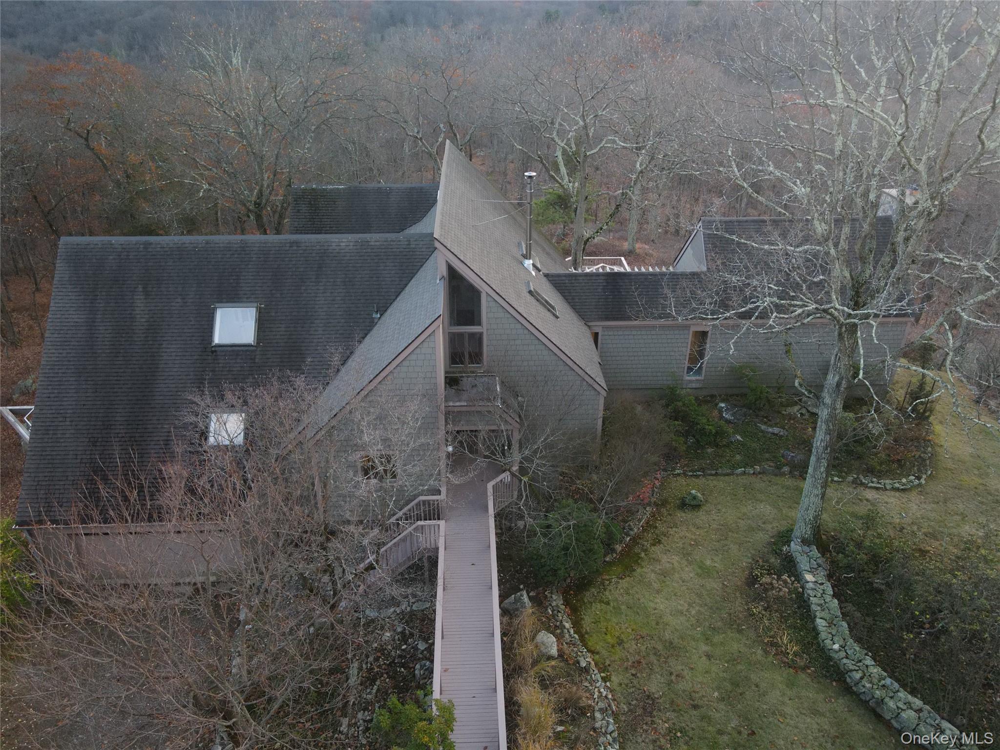 76 Whippoorwill Pond Road, Unit 78 Garrison, NY 10524 - Photo 3 of 24 a view of a outdoor space