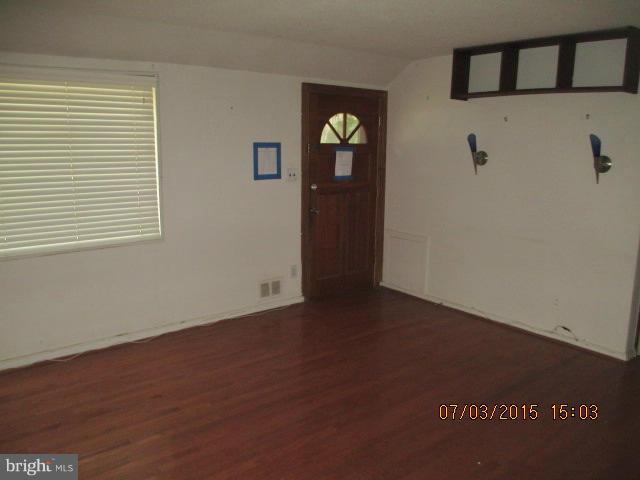 12704 Flack Street Silver Spring, MD 20906 - Photo 2 of 14 a view of an entryway with wooden floor