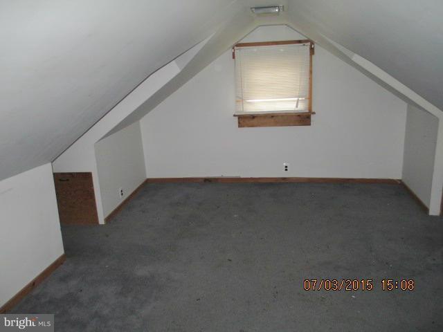 12704 Flack Street Silver Spring, MD 20906 - Photo 13 of 14 an empty room with a window
