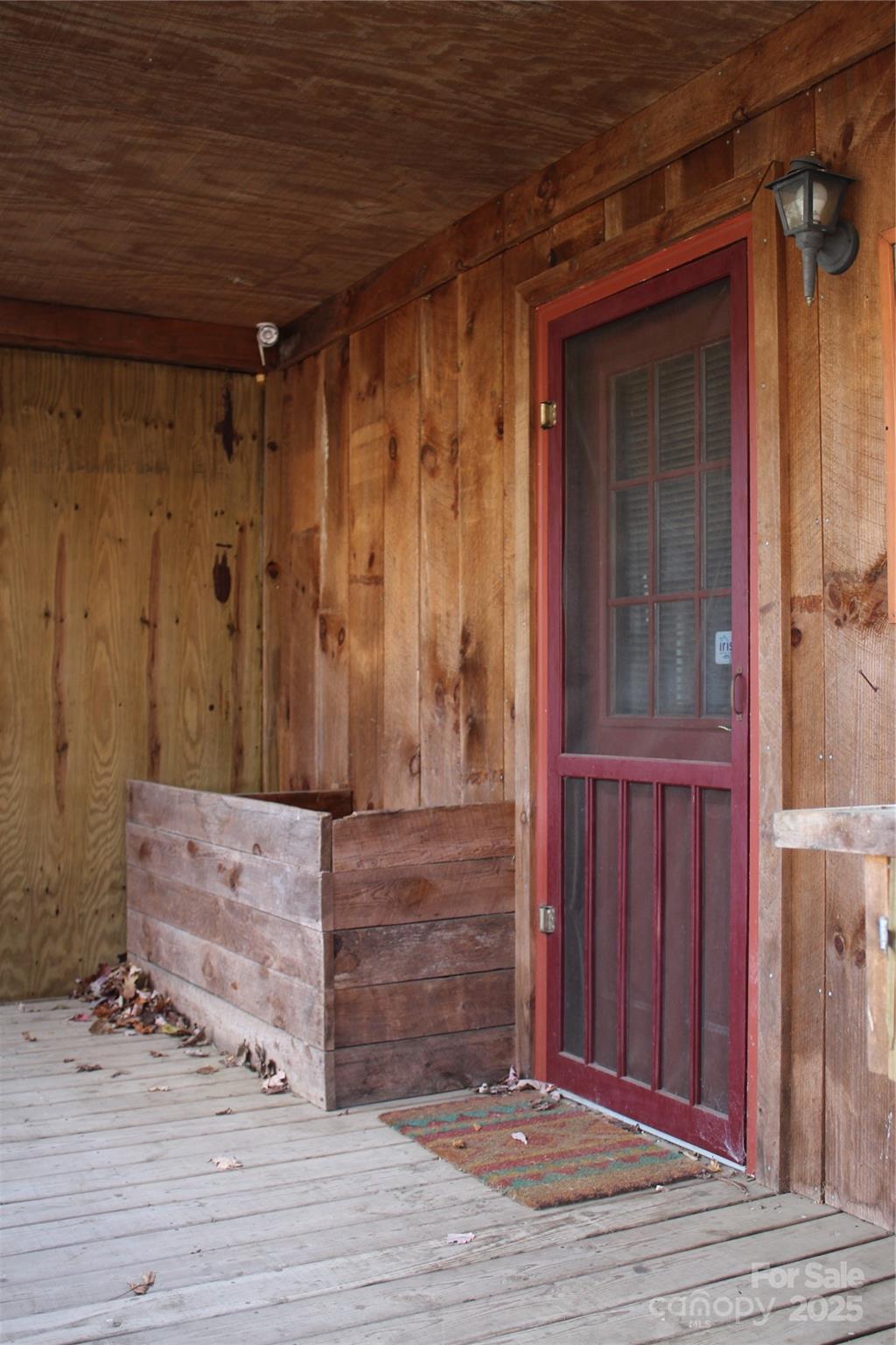 1571 Roaring Fork Road Burnsville, NC 28714 - Photo 17 of 37 a view of front door of a house