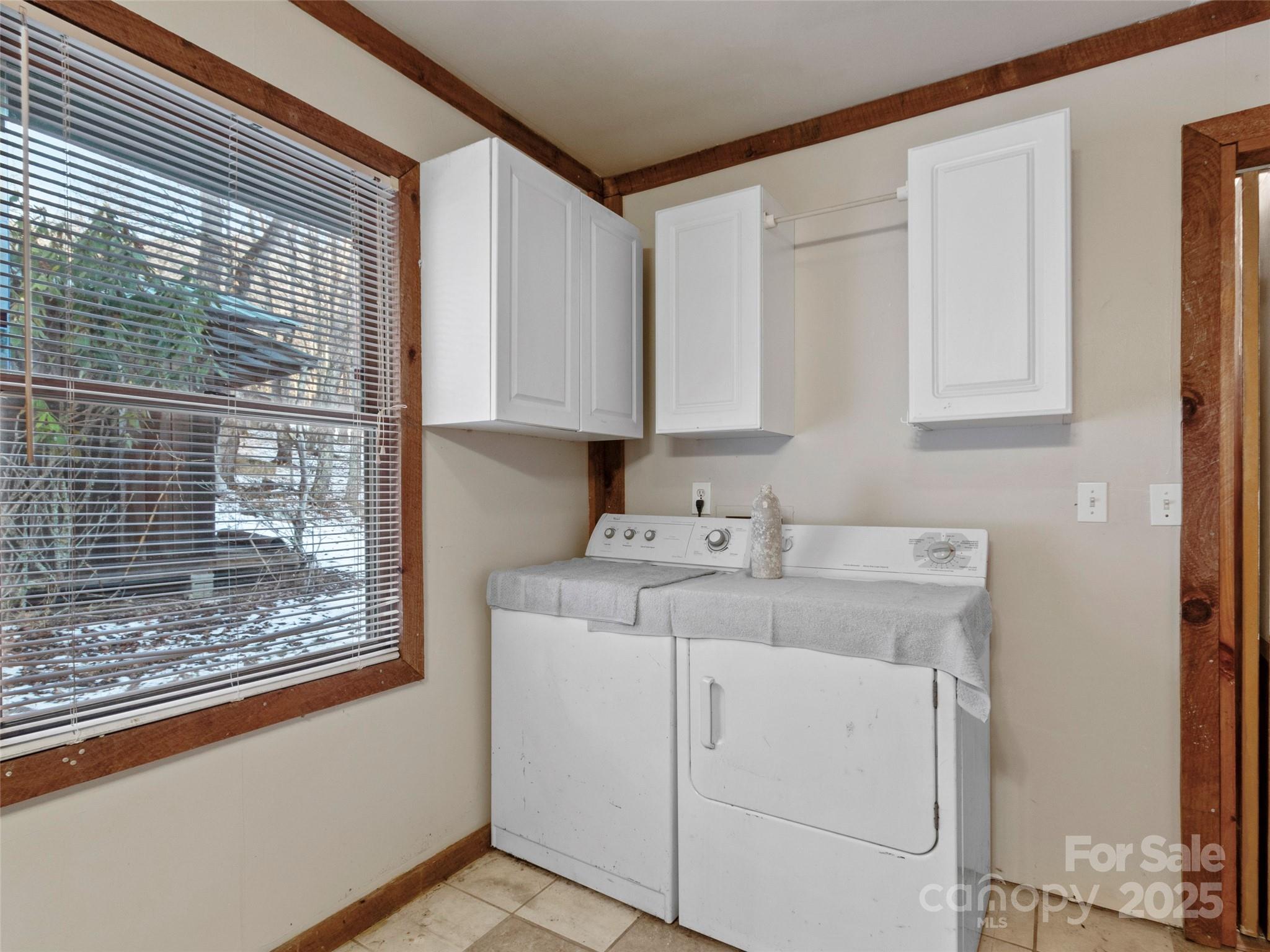 1571 Roaring Fork Road Burnsville, NC 28714 - Photo 25 of 37 a utility room with dryer and washer