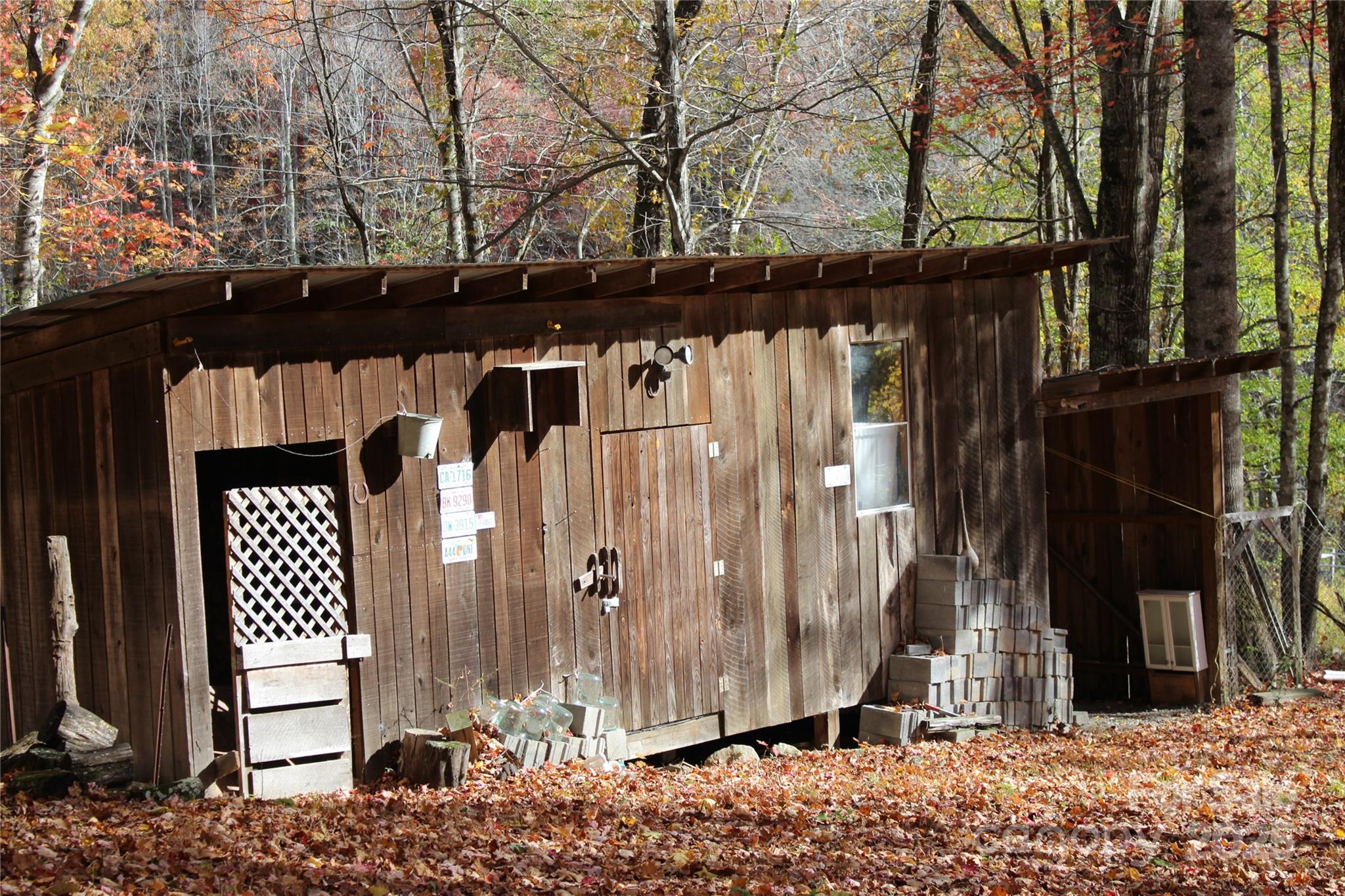 1571 Roaring Fork Road Burnsville, NC 28714 - Photo 8 of 37 a view of a pathway of a house