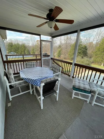 a view of balcony with furniture