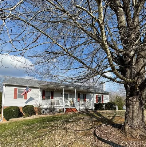 a front view of a house with patio