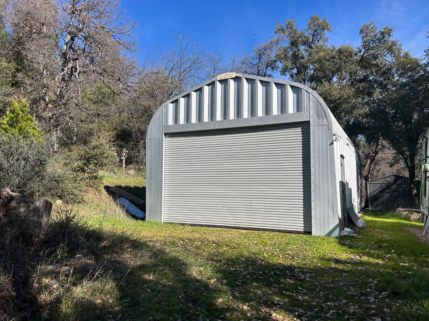 10121 Sun Ridge Court Nevada City, CA 95959 - Photo 3 of 14 a front view of house with yard
