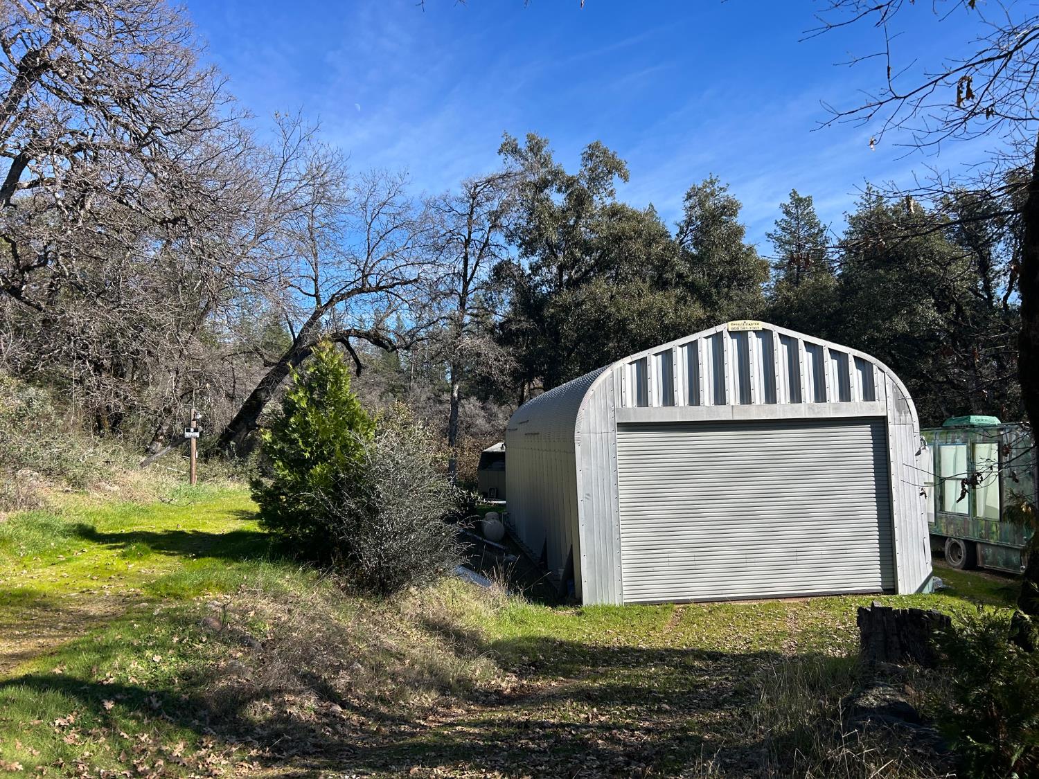 10121 Sun Ridge Court Nevada City, CA 95959 - Photo 4 of 14 a view of front of house with a yard