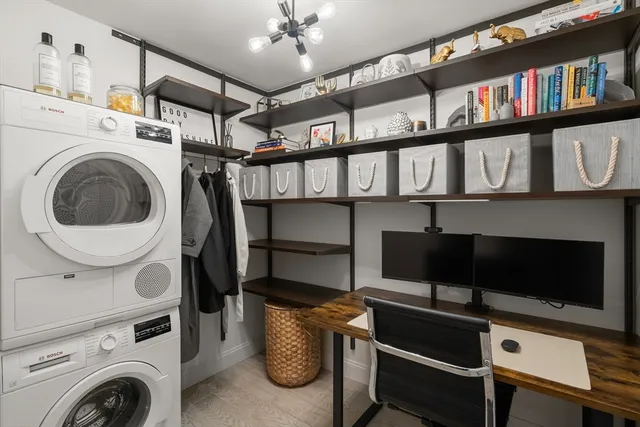 a view of room with washer and dryer