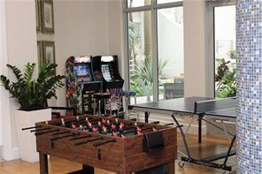 1830 Radius Drive, Unit 1113 Hollywood, FL 33020 - Photo 5 of 6 a view of a dining room with furniture and window