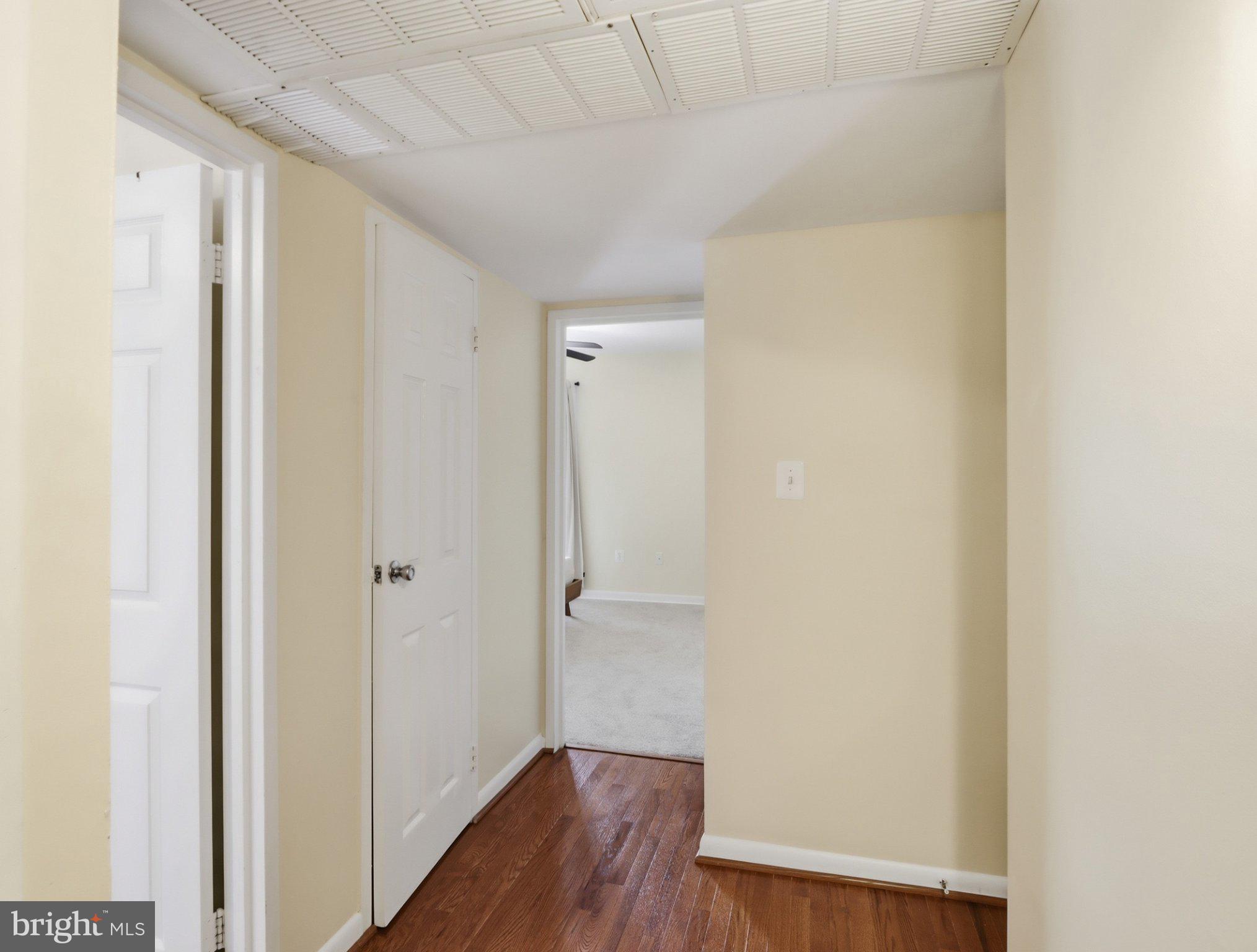 3204 Spartan Road, Unit 10 Olney, MD 20832 - Photo 14 of 31 Inviting hallway with warm tones.