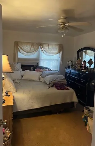 a kitchen with stainless steel appliances granite countertop a refrigerator and a stove