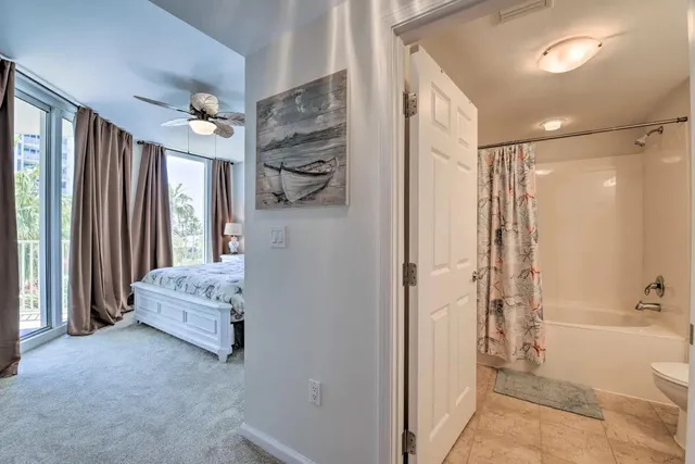 a spacious bathroom with a double vanity sink and a shower