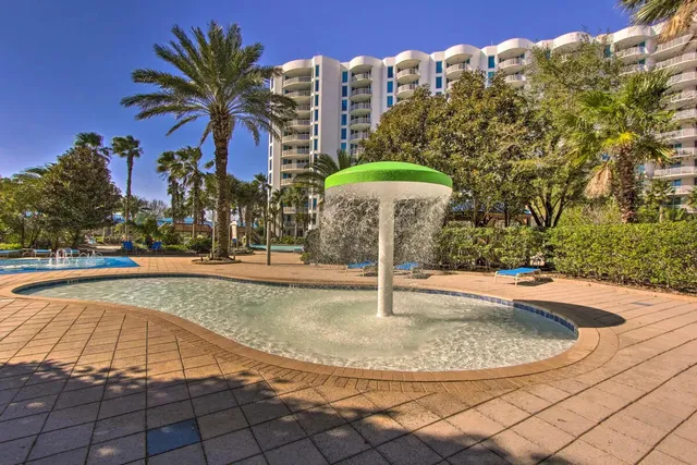 a view of a swimming pool with a terrace