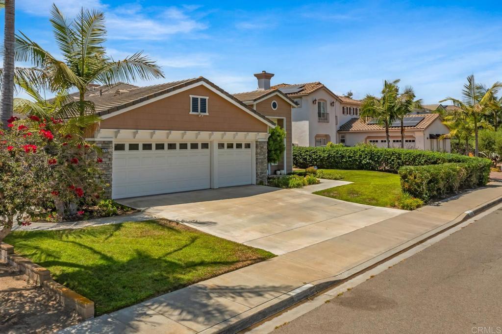 6743 Barberry Place Carlsbad, CA 92011 - Photo 3 of 10 a view of swimming pool with a garden in front of it