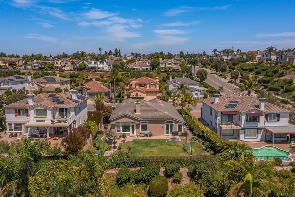 6743 Barberry Place Carlsbad, CA 92011 - Photo 4 of 10 an aerial view of residential houses with outdoor space