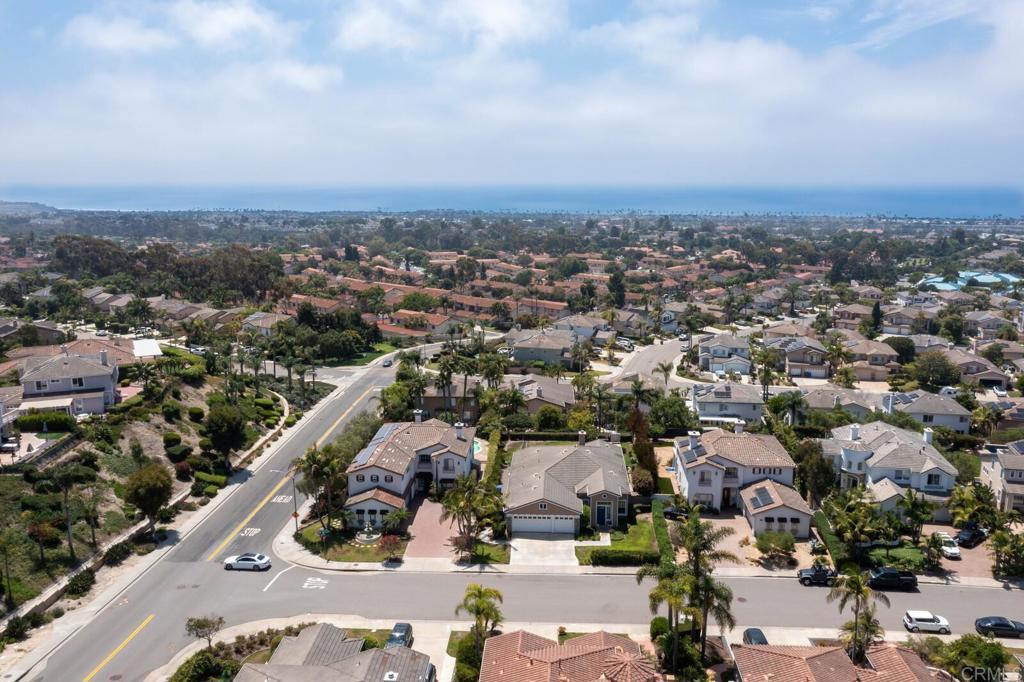 6743 Barberry Place Carlsbad, CA 92011 - Photo 6 of 10 an aerial view of a city with lots of residential buildings