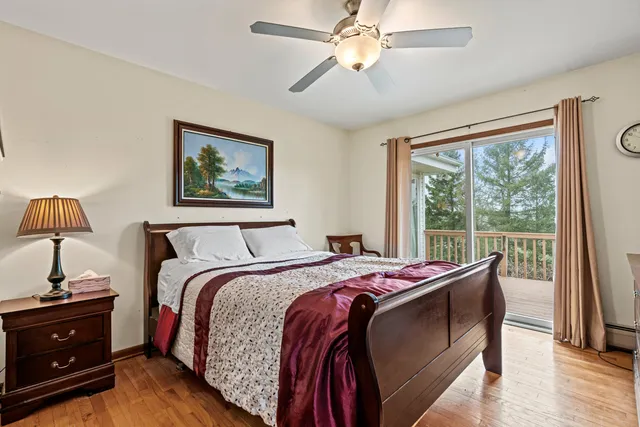 a bed room with a bed and a window