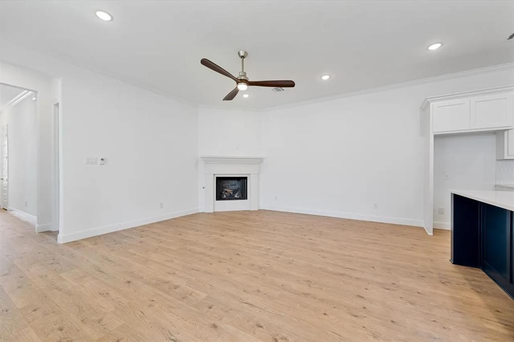9337 Loggerhead Way Fort Worth, TX 76118 - Photo 10 of 40 a view of an empty room with a fireplace