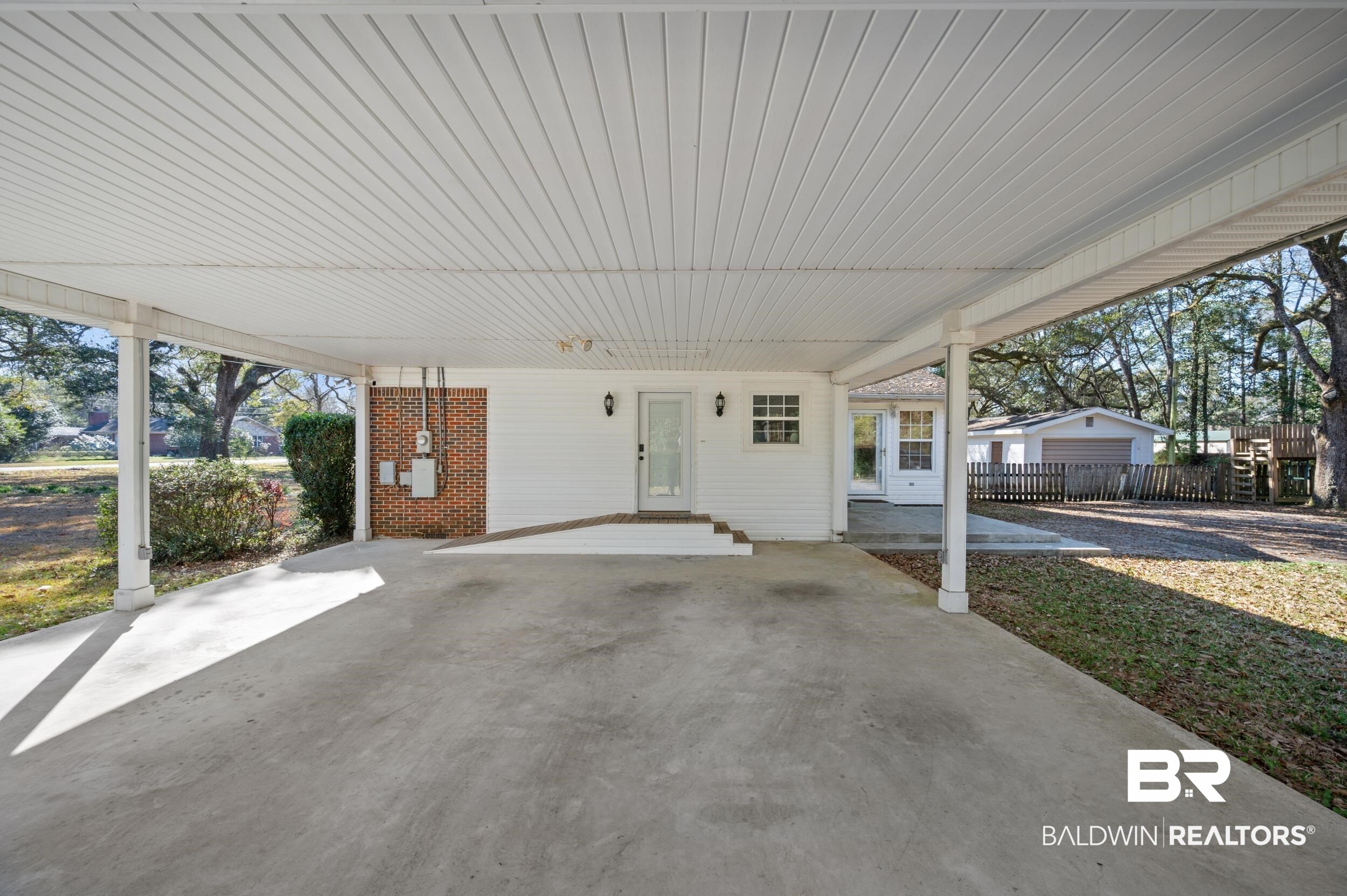809 Moog Avenue Bay Minette, AL 36507 - Photo 8 of 33 View of patio with a carport