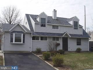 67 Granite Road Levittown, PA 19057 - Photo 1 of 6 a front view of a house with garden