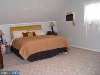 67 Granite Road Levittown, PA 19057 - Photo 5 of 6 a bedroom with a bed and a window