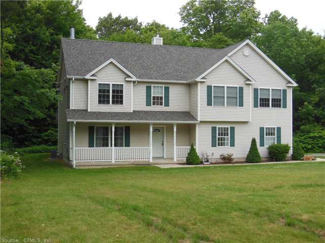 13 Old Schoolhouse Road Prospect, CT 06712 - Photo 1 of 1 a front view of a house with a yard