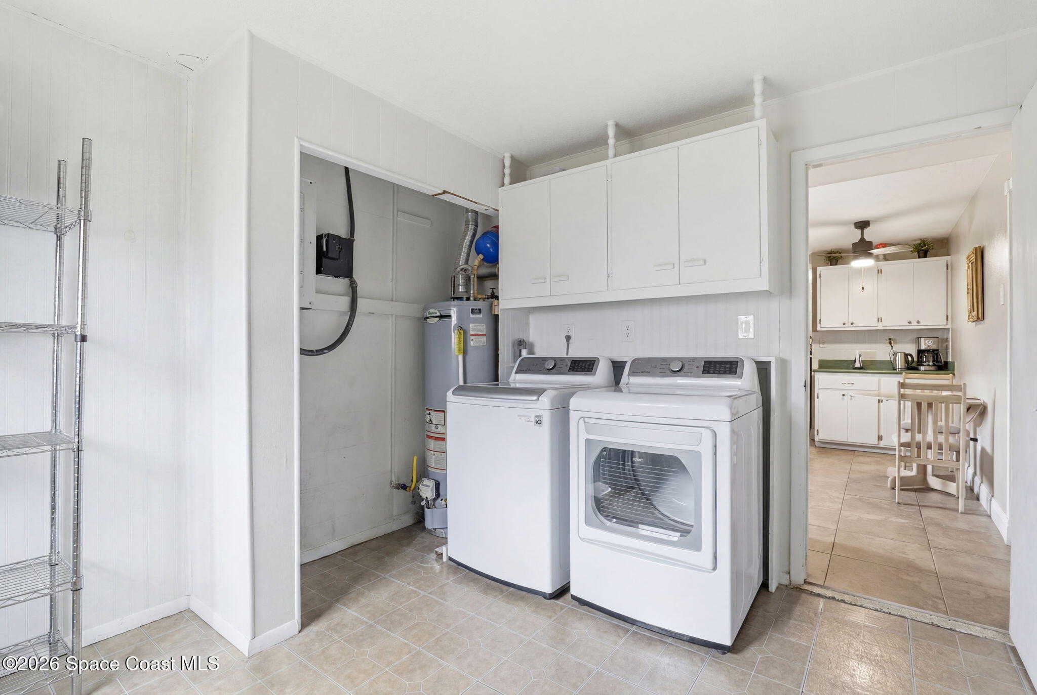 908 Jefferson Road Rockledge, FL 32955 - Photo 21 of 37 a view of kitchen and utility room