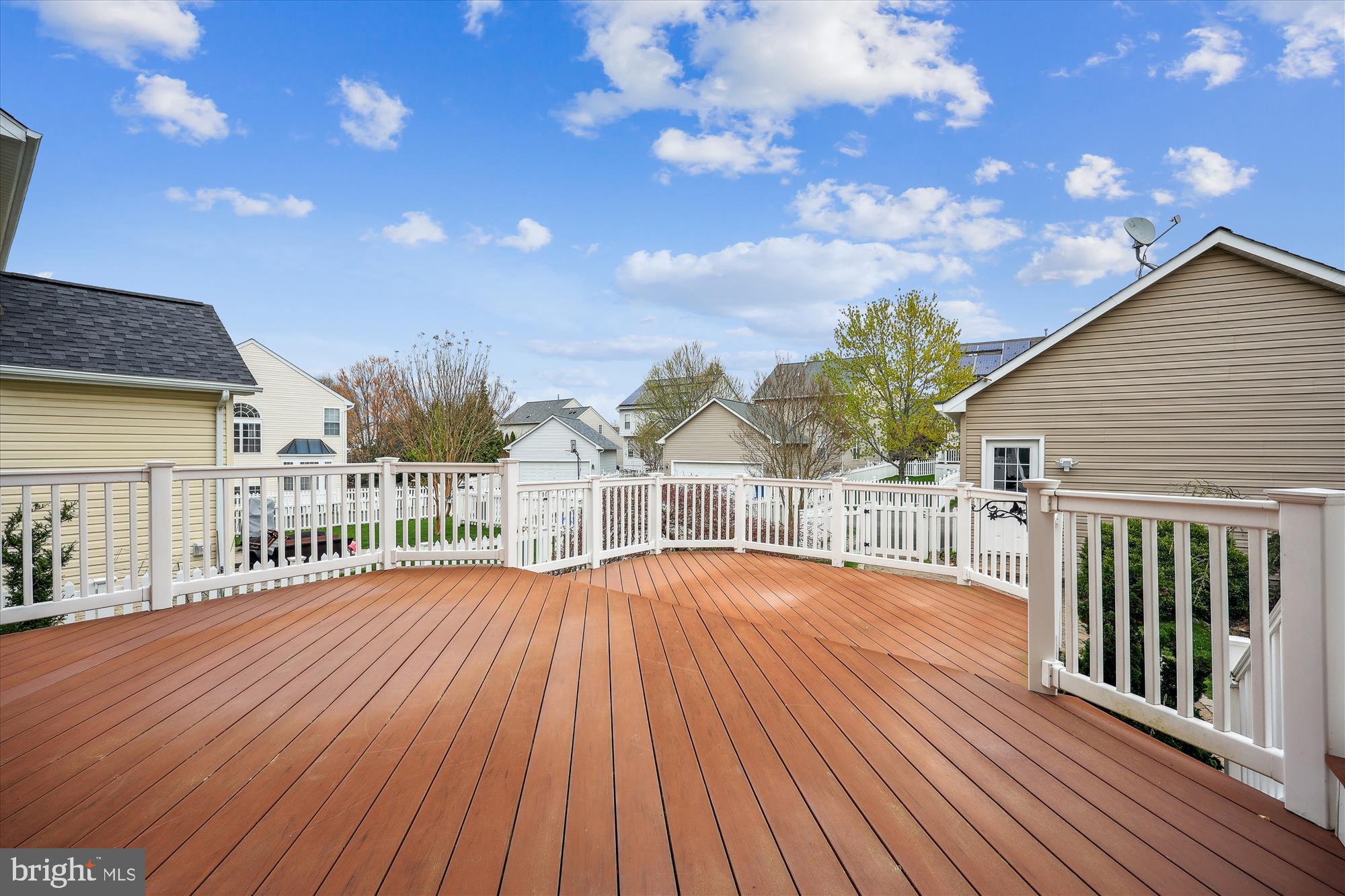 18301 Beechnut Way Boyds, MD 20841 - Photo 22 of 72 a view of backyard with a deck and wooden floor